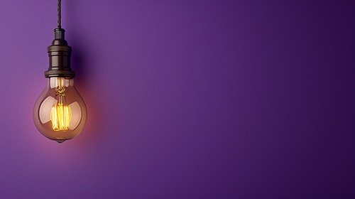 purple-wall-with-hanging-light-bulb (1)